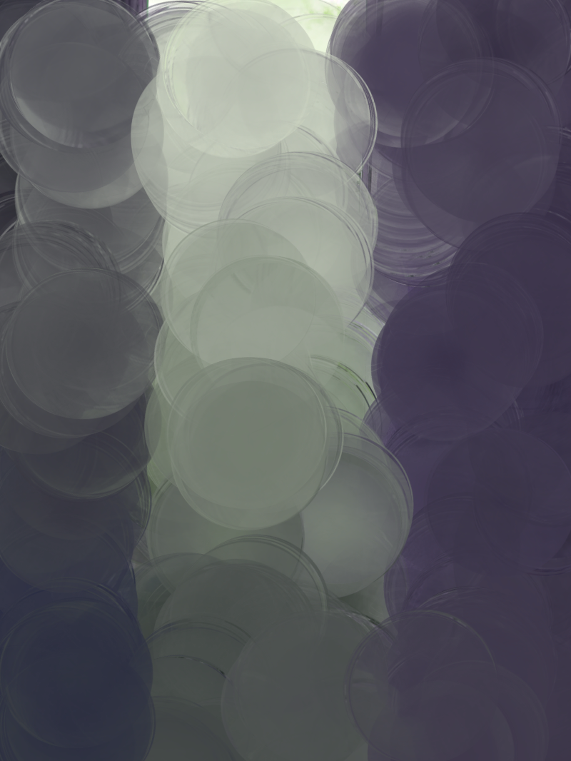 large blueish and greenish circles in kind of three columns arranged pretty randomly, the middle coluimn is brighter and greener, and the ones on the side are more dark, blue, and purple